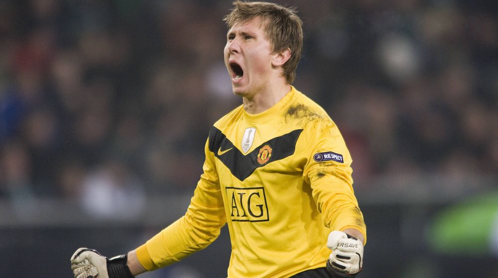 TOMASZ KUSZCZAK